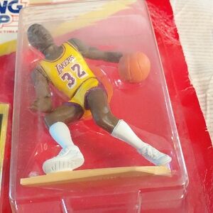 Basketball Star Action Figure in Purple and Yellow